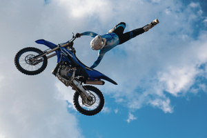 Motorcycle racers seen doing performance during the Moscow Sports day
at Luzhniki Stadium. Moscow Sports Day is a traditional festival of sports and activities. In 2025 Motorcycle racers from FMX13 Team (ProFMX Russia Team) performed at the Luzhniki Open Stadium.
