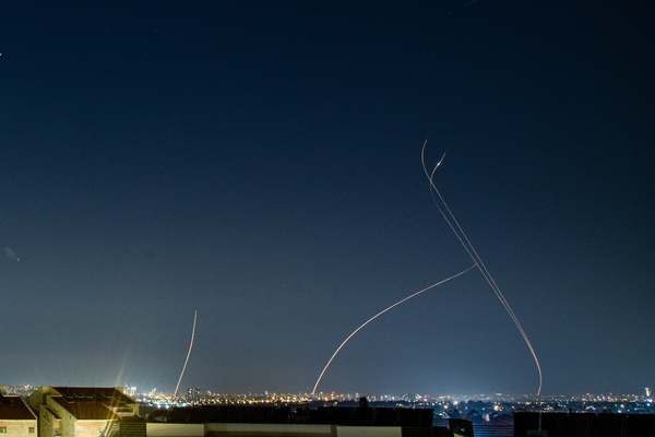 An Israeli Air defense system intercepts a ballistic missile barrage launched from Iran to central Israel during the missile attack.