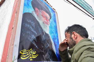 A Kashmiri Shiite Muslim mourns near a photograph of the deceased Iranian Supreme Leader, Ayatollah Ali Khamenei, during a protest rally against the U.S. and Israel in Budgam, about 25kms from Srinagar. Protests continue across the Kashmir valley over the killing of Iran's Supreme Leader Ayatollah Ali Khamenei in a coordinated US-Israeli airstrike on Tehran. Strict restrictions remained imposed in many areas of Kashmir for the fifth consecutive day.