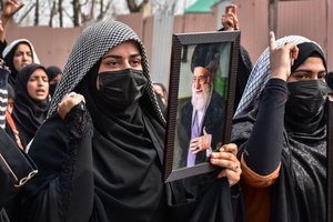 A Kashmiri Shiite Muslim protester holds a photograph of the deceased Iranian Supreme Leader, Ayatollah Ali Khamenei, during a protest rally against the U.S. and Israel in Budgam, about 25kms from Srinagar. Protests continue across the Kashmir valley over the killing of Iran's Supreme Leader Ayatollah Ali Khamenei in a coordinated US-Israeli airstrike on Tehran. Strict restrictions remained imposed in many areas of Kashmir for the fifth consecutive day.