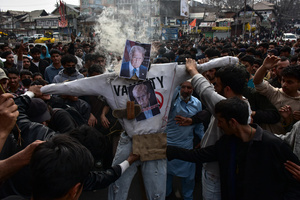 Kashmiri Shiite Muslim protesters burn effigy of US President Donald Trump Israeli Prime Minister Benjamin Netanyahu during a protest rally against the killing of the Iranian Supreme Leader, Ayatollah Ali Khamenei, in Budgam, about 25kms from Srinagar. Protests continue across the Kashmir valley over the killing of Iran's Supreme Leader Ayatollah Ali Khamenei in a coordinated US-Israeli airstrike on Tehran. Strict restrictions remained imposed in many areas of Kashmir for the fifth consecutive day.