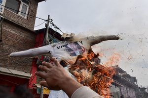 A Kashmiri Shiite Muslim protester burns effigy of US President Donald Trump during a protest rally against the killing of the Iranian Supreme Leader, Ayatollah Ali Khamenei, in Budgam, about 25kms from Srinagar. Protests continue across the Kashmir valley over the killing of Iran's Supreme Leader Ayatollah Ali Khamenei in a coordinated US-Israeli airstrike on Tehran. Strict restrictions remained imposed in many areas of Kashmir for the fifth consecutive day.