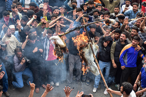 Kashmiri Shiite Muslim protesters shout slogans as they burn effigies of US President Donald Trump and Israeli Prime Minister Benjamin Netanyahu during a protest rally against the killing of the Iranian Supreme Leader, Ayatollah Ali Khamenei, in Budgam, about 25kms from Srinagar. Protests continue across the Kashmir valley over the killing of Iran's Supreme Leader Ayatollah Ali Khamenei in a coordinated US-Israeli airstrike on Tehran. Strict restrictions remained imposed in many areas of Kashmir for the fifth consecutive day.