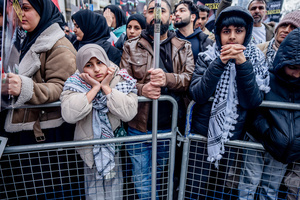 Young British-based Irainians attend the pro-Iranian regime rally in Central London. Many thousands congregated in Central London in an international demonstration of support for Palestinian rights. They were separated by Police from pro-Israeli and anti-Iranian-regime counter-protestors who met on the opposite side of the River Thames after the rally was banned from marching by the Home Secretary Shabana Mahmood. Rapper Bob Vylan spoke at the rally and is currently being investigated for chanting “Death to the IDF”.