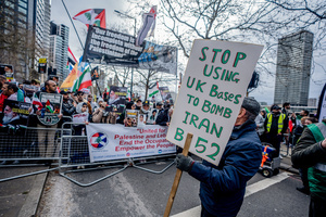 Pro-Iranian regime protestor calls on the UK government to stop allowing the US to use UK bases to refuel whilst bombing Iran. Many thousands congregated in Central London in an international demonstration of support for Palestinian rights. They were separated by Police from pro-Israeli and anti-Iranian-regime counter-protestors who met on the opposite side of the River Thames after the rally was banned from marching by the Home Secretary Shabana Mahmood. Rapper Bob Vylan spoke at the rally and is currently being investigated for chanting “Death to the IDF”.