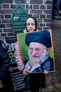 A young pro-Iranian regime British-Iranian girl holds aloft a poster of the Ayatollah Ali Khamenei who was killed in the joint US-Israeli attack. Many thousands congregated in Central London in an international demonstration of support for Palestinian rights. They were separated by Police from pro-Israeli and anti-Iranian-regime counter-protestors who met on the opposite side of the River Thames after the rally was banned from marching by the Home Secretary Shabana Mahmood. Rapper Bob Vylan spoke at the rally and is currently being investigated for chanting “Death to the IDF”.