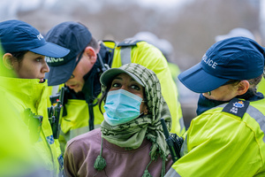 A pro-Palestinian protestor is arrested by police for refusing to remove a face covering. Many thousands congregated in Central London in an international demonstration of support for Palestinian rights. They were separated by Police from pro-Israeli and anti-Iranian-regime counter-protestors who met on the opposite side of the River Thames after the rally was banned from marching by the Home Secretary Shabana Mahmood. Rapper Bob Vylan spoke at the rally and is currently being investigated for chanting “Death to the IDF”.