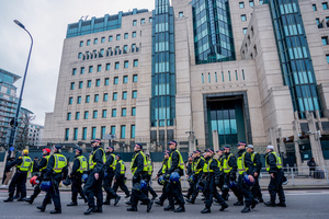 Police Officers patrolling the rally, march past the MI5 building in Vauxall, London. Many thousands congregated in Central London in an international demonstration of support for Palestinian rights. They were separated by Police from pro-Israeli and anti-Iranian-regime counter-protestors who met on the opposite side of the River Thames after the rally was banned from marching by the Home Secretary Shabana Mahmood. Rapper Bob Vylan spoke at the rally and is currently being investigated for chanting “Death to the IDF”.