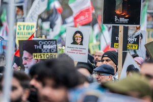 A cartoon of Home Secretary Shabana Mahmood criticises her banning the annual Al-Quds march as an act of suppressing free speech. Many thousands congregated in Central London in an international demonstration of support for Palestinian rights. They were separated by Police from pro-Israeli and anti-Iranian-regime counter-protestors who met on the opposite side of the River Thames after the rally was banned from marching by the Home Secretary Shabana Mahmood. Rapper Bob Vylan spoke at the rally and is currently being investigated for chanting “Death to the IDF”.