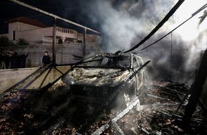 A car is charred after an attack by Jewish settlers on the village of Deir al-Hatab, east of Nablus in the West Bank. Israeli settlers from Elon Moreh carried out attacks in several Palestinian villages, including Deir al-Hatab, following the funeral of 18-year-old Yehuda Sherman. Israeli police said Sherman died in a car collision with a Palestinian vehicle and are investigating whether it was deliberate or an accident. After the funeral, settlers set fire to homes and vehicles and spray-painted “revenge” in Hebrew, leaving at least 10 Palestinians injured, including one man shot and a woman treated for smoke inhalation.