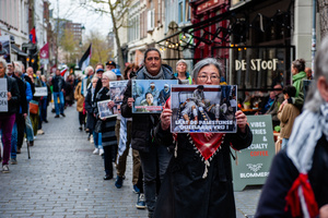 Activists are holding placards with photos of Palestinian hostages. Activists performed as the Palestinian hostages held by the Israel government during a silent procession through the city to demand their release and against Israel's new execution law. With this protest, Nijmegen for Palestine wants to draw attention to the Palestinian hostages, who are often held for months, even years, without charge in appalling Israeli detention camps.