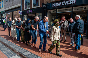 The activists, performing as Palestinian hostages, are walking barefoot on the streets. Activists performed as the Palestinian hostages held by the Israel government during a silent procession through the city to demand their release and against Israel's new execution law. With this protest, Nijmegen for Palestine wants to draw attention to the Palestinian hostages, who are often held for months, even years, without charge in appalling Israeli detention camps.