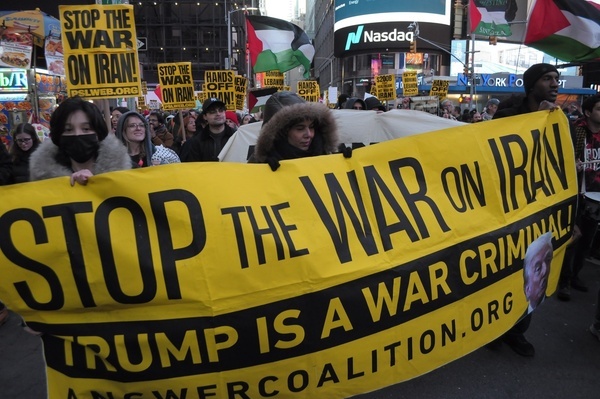 Demonstrators hold banners and Palestinian flags during a march protesting war against Iran. Demonstrators rallied in Manhattan, New York City condemning the Trump administration and Israel for launching airstrikes against Iran. The rally occurred after the U.S. and Iran agreed to a two-week ceasefire on Tuesday. The U.S. demands Iran to reopen the Strait of Hormuz. Following the ceasefire, Israel launched missile strikes against targets in Lebanon. Iran claims Israel has violated the ceasefire.