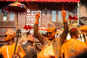 Reveler take part during the Festival. Sindoor Jatra or vermillion powder festival is celebrated each year to welcome the start of spring and Nepalese New Year, by playing a traditional instrument, singing, dancing, and carrying chariots of several gods and goddesses around the place.