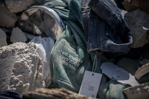 Some clothing in rubble in the village of Mansouri, in southern Lebanon. After a 10-day ceasefire declared on April 16, 2026, displaced families in Lebanon began returning to assess widespread destruction from weeks of fighting that killed over 2,400 people. Many homes, hospitals, and key infrastructure were damaged, while more than one million people remain displaced. Despite the pause, access to some areas is restricted, and fears persist that fighting could resume.