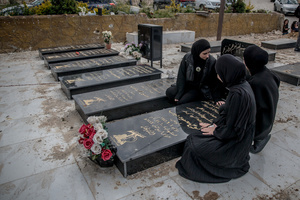 Women pray by the grave of their father, who was killed in 2024, at a cemetery in the village of Majdal Zoun, Tyre district. After a 10-day ceasefire declared on April 16, 2026, displaced families in Lebanon began returning to assess widespread destruction from weeks of fighting that killed over 2,400 people. Many homes, hospitals, and key infrastructure were damaged, while more than one million people remain displaced. Despite the pause, access to some areas is restricted, and fears persist that fighting could resume.