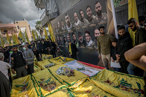 A funeral for 15 Hezbollah fighters in the village of Qlaileh, Tyre District. Hezbollah held a mass funeral in Qlaileh, southern Lebanon, for 15 fighters and one civilian killed during the conflict with Israel. The burials took place during a 10-day ceasefire that allowed families to return to the area. Many of the deceased had been temporarily buried elsewhere due to ongoing fighting.