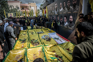A funeral for 15 Hezbollah fighters in the village of Qlaileh, Tyre District. Hezbollah held a mass funeral in Qlaileh, southern Lebanon, for 15 fighters and one civilian killed during the conflict with Israel. The burials took place during a 10-day ceasefire that allowed families to return to the area. Many of the deceased had been temporarily buried elsewhere due to ongoing fighting.
