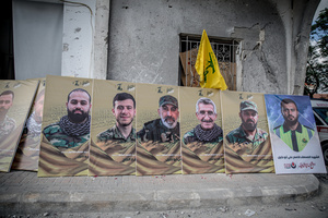 Posters of Hezbollah fighters and a member of the Islamic Health Authority during a funeral in the village of Qlaileh, Tyre District. Hezbollah held a mass funeral in Qlaileh, southern Lebanon, for 15 fighters and one civilian killed during the conflict with Israel. The burials took place during a 10-day ceasefire that allowed families to return to the area. Many of the deceased had been temporarily buried elsewhere due to ongoing fighting.