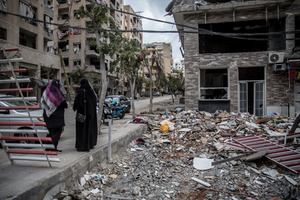 Women walk past rubble in Beirut’s southern suburbs, known as Dahieyh, during a 10-day ceasefire between Israel and Hezbollah. Many displaced people used the opportunity to check on their homes. After a 10-day ceasefire declared on April 16, 2026, displaced families in Lebanon began returning to assess widespread destruction from weeks of fighting that killed over 2,400 people. Many homes, hospitals, and key infrastructure were damaged, while more than one million people remain displaced. Despite the pause, access to some areas is restricted, and fears persist that fighting could resume.