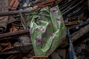 A flowery table cover seen among rubble in Beirut’s southern suburbs, known as Dahieyh, pictured during a 10-day ceasefire between Israel and Hezbollah. Many displaced people used the opportunity to check on their homes. After a 10-day ceasefire declared on April 16, 2026, displaced families in Lebanon began returning to assess widespread destruction from weeks of fighting that killed over 2,400 people. Many homes, hospitals, and key infrastructure were damaged, while more than one million people remain displaced. Despite the pause, access to some areas is restricted, and fears persist that fighting could resume.