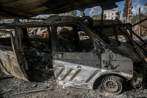 A burnt civil defence vehicle in the village of Jibchit, in the Nabatieh district, southern Lebanon. After a 10-day ceasefire declared on April 16, 2026, displaced families in Lebanon began returning to assess widespread destruction from weeks of fighting that killed over 2,400 people. Many homes, hospitals, and key infrastructure were damaged, while more than one million people remain displaced. Despite the pause, access to some areas is restricted, and fears persist that fighting could resume.
