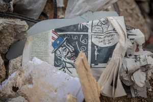 A comic is seen in the rubble in Jibchit, Nabatieh district. After a 10-day ceasefire declared on April 16, 2026, displaced families in Lebanon began returning to assess widespread destruction from weeks of fighting that killed over 2,400 people. Many homes, hospitals, and key infrastructure were damaged, while more than one million people remain displaced. Despite the pause, access to some areas is restricted, and fears persist that fighting could resume.