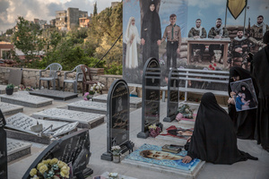Women pray at a grave at a cemetery in Jibchit, Nabatieh district. After a 10-day ceasefire declared on April 16, 2026, displaced families in Lebanon began returning to assess widespread destruction from weeks of fighting that killed over 2,400 people. Many homes, hospitals, and key infrastructure were damaged, while more than one million people remain displaced. Despite the pause, access to some areas is restricted, and fears persist that fighting could resume.