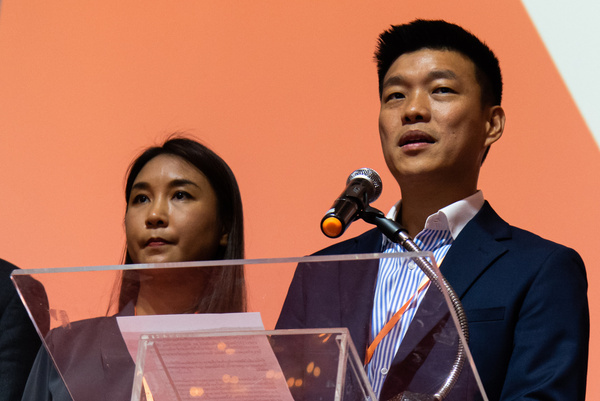Natthaphong Ruengpanyawut, leader of the People's Party, and his deputy, Sirikanya Tansakun, were seen speaking to the media during a press conference at the Maple Hotel. Thailand’s Supreme Court has accepted a case against 44 Members of Parliament from the People’s Party, including leader Natthaphong Ruengpanyawut. The court will examine whether they committed a serious ethical breach by supporting a 2021 petition to amend the country’s lese-majeste law (Article 112). If found guilty, the MPs could face lifetime bans from politics, a move that could significantly impact Thailand’s political landscape.