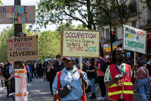 Members of the Confédération Générale du Travail (CGT) trade union collect donations during the May Day celebration in Paris. Tens of thousands of trade unionists and grassroots activists gathered in Paris to celebrate the achievements of the labor movement and raise awareness of workers’ rights.