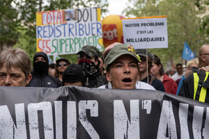 A protester chants slogans during the May Day demonstration in Paris. Tens of thousands of trade unionists and grassroots activists gathered in Paris to celebrate the achievements of the labor movement and raise awareness of workers’ rights.