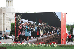 People walk past retro decorations during the celebrating Victory Day at the Exhibition of Achievements of the National Economy (VDNKh) Moscow marked the 81st anniversary of the Soviet victory over Nazi Germany on May 9 with commemorative events across the city honoring those who fought in World War II. Some residents took part in memorial activities remembering the wartime generation.