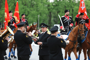 The Kremlin Equestrian School's horsemen accompanied by an orchestra seen during the performance dedicated to Victory Day 9 May at the Exhibition of Achievements of the National Economy (VDNKh) Moscow marked the 81st anniversary of the Soviet victory over Nazi Germany on May 9 with commemorative events across the city honoring those who fought in World War II. Some residents took part in memorial activities remembering the wartime generation.