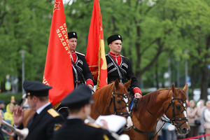 The Kremlin Equestrian School's horsemen accompanied by an orchestra seen during the performance dedicated to Victory Day at the Exhibition of Achievements of the National Economy (VDNKh) Moscow marked the 81st anniversary of the Soviet victory over Nazi Germany on May 9 with commemorative events across the city honoring those who fought in World War II. Some residents took part in memorial activities remembering the wartime generation.