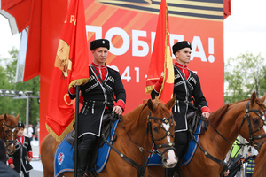 The Kremlin Equestrian School's horsemen with Soviet Union flags seen during the performance dedicated to Victory Day at the Exhibition of Achievements of the National Economy (VDNKh) Moscow marked the 81st anniversary of the Soviet victory over Nazi Germany on May 9 with commemorative events across the city honoring those who fought in World War II. Some residents took part in memorial activities remembering the wartime generation.