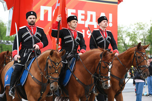 The Kremlin Equestrian School's horsemen with Soviet Union flags seen during the performance dedicated to Victory Day at the Exhibition of Achievements of the National Economy (VDNKh) Moscow marked the 81st anniversary of the Soviet victory over Nazi Germany on May 9 with commemorative events across the city honoring those who fought in World War II. Some residents took part in memorial activities remembering the wartime generation.