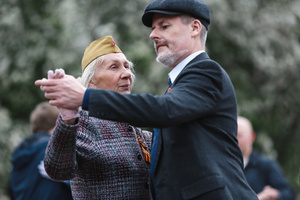 Veterans dance during the Victory Day celebrations at Gorky Park in central Moscow. People wearing vintage clothing and Soviet-era uniforms gathered at Gorky Park, where some participants performed the traditional “Victory Waltz” during commemorations in Moscow. The dance honors the wartime generation and remains a symbolic part of Victory Day celebrations.