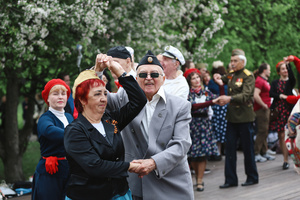 Veterans dance during the Victory Day celebrations at Gorky Park in central Moscow. People wearing vintage clothing and Soviet-era uniforms gathered at Gorky Park, where some participants performed the traditional “Victory Waltz” during commemorations in Moscow. The dance honors the wartime generation and remains a symbolic part of Victory Day celebrations.