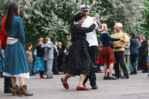 Veterans dance during the Victory Day celebrations at Gorky Park in central Moscow. People wearing vintage clothing and Soviet-era uniforms gathered at Gorky Park, where some participants performed the traditional “Victory Waltz” during commemorations in Moscow. The dance honors the wartime generation and remains a symbolic part of Victory Day celebrations.