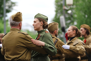 People dance during the Victory Day celebrations at Gorky Park in central Moscow. People wearing vintage clothing and Soviet-era uniforms gathered at Gorky Park, where some participants performed the traditional “Victory Waltz” during commemorations in Moscow. The dance honors the wartime generation and remains a symbolic part of Victory Day celebrations.