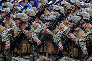 Military personnel parade with weapons during the 147th commemoration of Naval Glories Day. Commemoration number 147 of Naval Glories Day, with the presence of the president of Chile Jose Antonio Kast, in the city of Valparaiso, Chile.