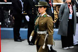 A policewoman marches during the 147th commemoration of Naval Glories Day. Commemoration number 147 of Naval Glories Day, with the presence of the president of Chile Jose Antonio Kast, in the city of Valparaiso, Chile.
