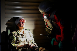 Red Cross medics provide first aid to victims of a Russian missile attack. A large ballistic missile attack pounded Kyiv early on May 24, authorities said, wounding at least five people after Moscow threatened retaliation for strikes in Russian-occupied eastern Ukraine.