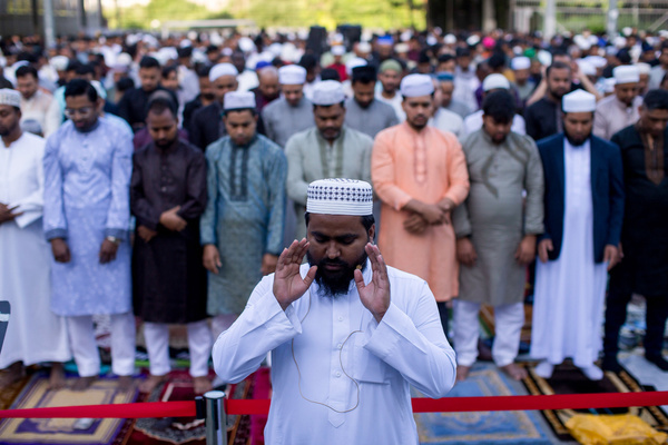 The imam, a member of the Muslim community, leads prayers during the celebration of the Feast of the Sacrifice, "Eid al-Adha," in the Casino de la Reina park in the Lavapiés neighborhood. Eid al-Adha is a festival that symbolizes devotion and gratitude to God (Allah).