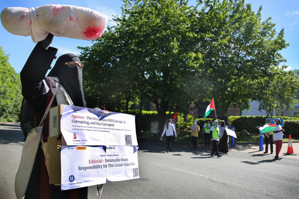 A supporter holds up a model of a baby to signify all the children killed by weaponry made by Elbit Systems outside the factory during the demonstration. Members of the local community supporting Palestine gathered outside the UAV Tactical Systems (U-TacS) factory to protest against its parent company, Israeli defense contractor Elbit Systems. Demonstrators accused the company of manufacturing drones used by the Israeli military in Gaza, Lebanon, and elsewhere, and called for the facility to shut down and leave the area.