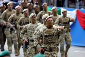 Italian Army Special Forces paratroopers march during the parade. Heads of state and government attended the 80th Anniversary of Republic Day celebrations and the traditional military parade through the Imperial Fora. The ceremony, which pays homage to the values ​​of the Republic and the Armed Forces, took place in the heart of the capital before the highest Italian institutional officials and international delegations.