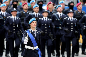 A female prison police officer marches during the parade. Heads of state and government attended the 80th Anniversary of Republic Day celebrations and the traditional military parade through the Imperial Fora. The ceremony, which pays homage to the values ​​of the Republic and the Armed Forces, took place in the heart of the capital before the highest Italian institutional officials and international delegations.