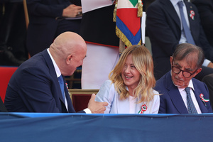 (L to R) Minister of Defense Guido Crosetto jokes with Prime Minister Giorgia Meloni at his side President of the Senate Ignazio La Russa during the parade. Heads of state and government attended the 80th Anniversary of Republic Day celebrations and the traditional military parade through the Imperial Fora. The ceremony, which pays homage to the values ​​of the Republic and the Armed Forces, took place in the heart of the capital before the highest Italian institutional officials and international delegations.