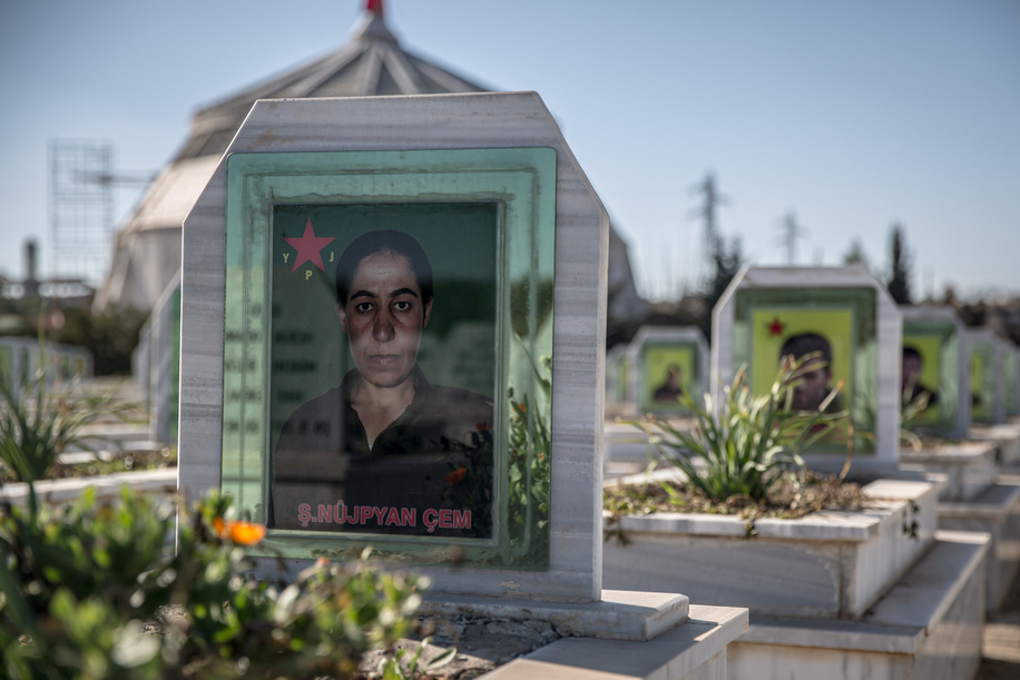 A grave of a female fighter at the Martyrs’ Cemetery in Kobane, northern Syria, where graves of Women's Defense Units (YPJ) and People's Defense Units (YPG) fighters, and members of the Asayish internal security forces killed in fighting with government forces in January are visible beside older graves of those killed fighting ISIS. The Kurdish-led Syrian Democratic Forces (SDF) lost huge swathes of territory in January, leaving the northern Syrian city isolated.