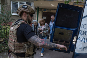 The Ukrainian police unit officers ‘White Angels’ evacuates civilians from the city under the constant threat of Russian FPV drones.